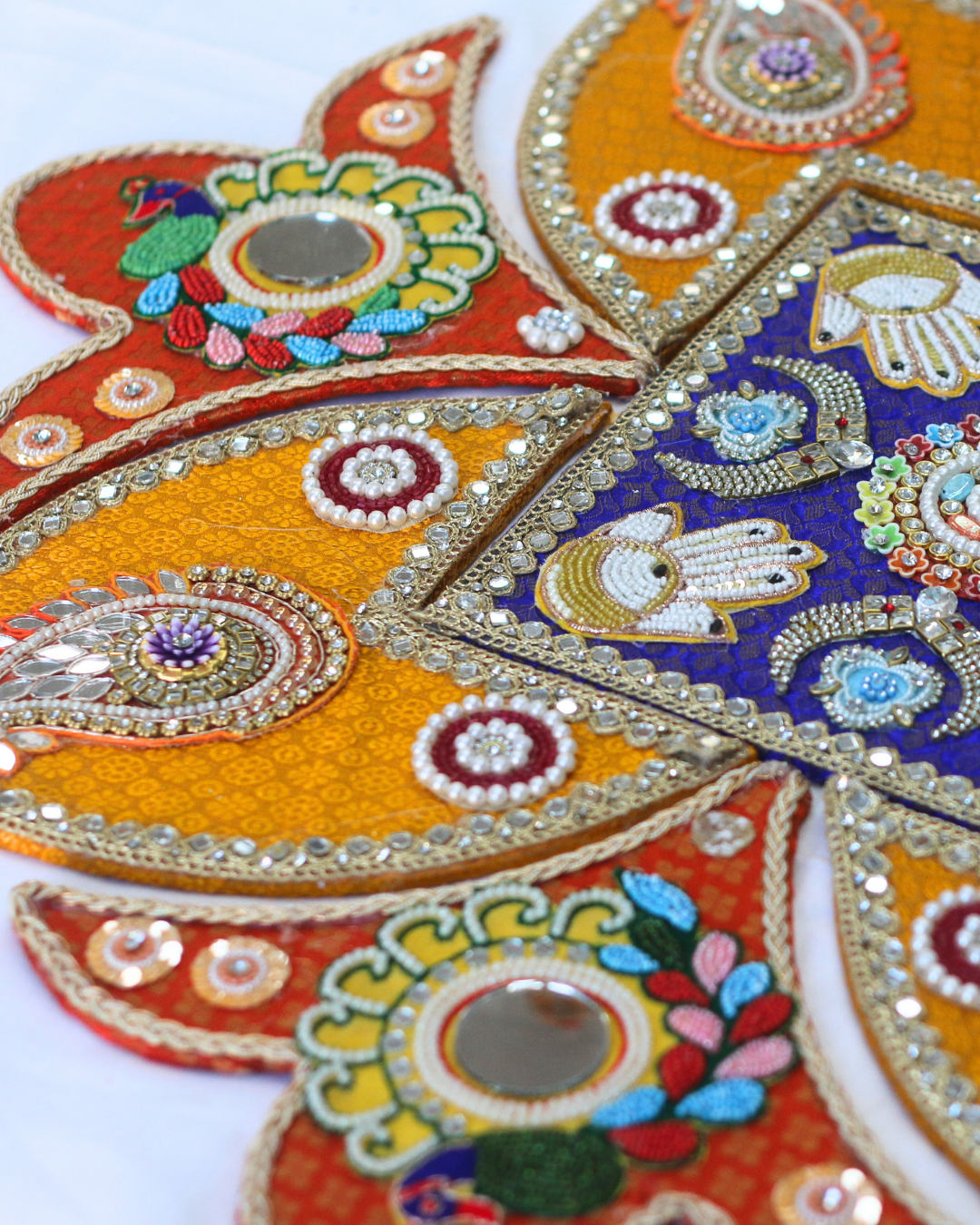 9 Piece Blue/Yellow/Red Hamsa and Peacock Rangoli Set
